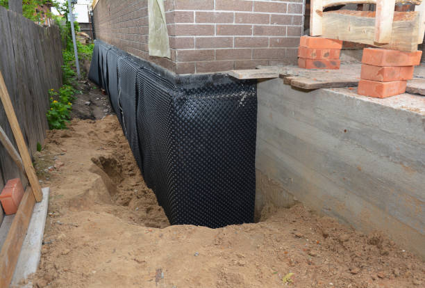 SJ Waterproofing Pros technician performing targeted Waterproofing assessment in Rochelle, VA
